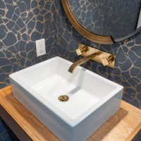 Power room modern square sink with vanity and gold accents